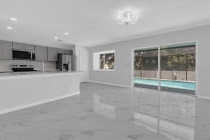 7001 HOLLOWELL DRIVE, TAMPA, FL 33634 - MLS#MFRTB8407478