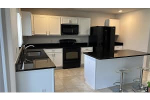12609 OULTON CIRCLE, ORLANDO, FL 32832 - MLS#MFRTB8409087