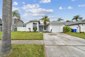 12811 MILLRIDGE FOREST STREET, TAMPA, FL 33624 - MLS#MFRTB8423778