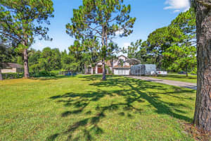 7911 PINE LANDS DRIVE, WESLEY CHAPEL, FL 33544 - MLS#MFRTB8424596