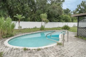 9709 WOODLAND RIDGE DRIVE, TEMPLE TERRACE, FL 33637 - MLS#MFRTB8426222