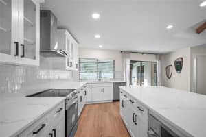 13903 WOLCOTT DRIVE, TAMPA, FL 33624 - MLS#MFRTB8428514