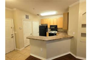 10205 COURTNEY PALMS BOULEVARD, TAMPA, FL 33619 - MLS#MFRTB8431720