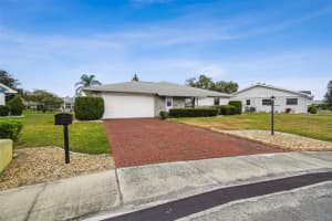 1803 PINEAPPLE PALM COURT, SUN CITY CENTER, FL 33573 - MLS#MFRTB8431765