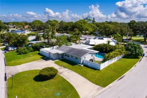 8801 SUNLIT COVE DRIVE, ST PETERSBURG, FL 33702 - MLS#MFRTB8433466