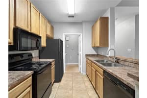 10105 COURTNEY PALMS BOULEVARD, TAMPA, FL 33619 - MLS#MFRTB8434757