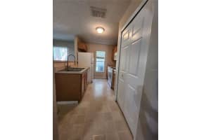 9956 ASHBURN LAKE DRIVE, TAMPA, FL 33610 - MLS#MFRTB8436070