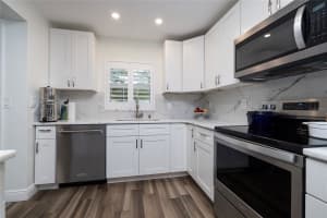 1753 BELLEAIR FOREST DRIVE, BELLEAIR, FL 33756 - MLS#MFRTB8447860