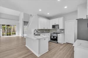 3290 COVERED BRIDGE DRIVE, DUNEDIN, FL 34698 - MLS#MFRTB8449944