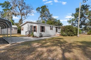 11622 GROVEWOOD AVENUE, THONOTOSASSA, FL 33592 - MLS#MFRTB8454694