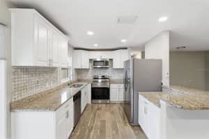 5613 57TH AVENUE, ST PETERSBURG, FL 33709 - MLS#MFRTB8469370