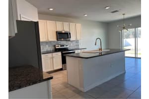 1703 JOHNSON POINTE DRIVE, PLANT CITY, FL 33566 - MLS#MFRTB8472648