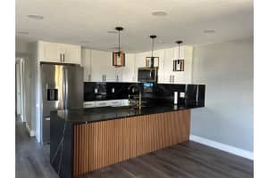 2119 E ELLICOTT, TAMPA, FL 33610 - MLS#MFRTB8473065