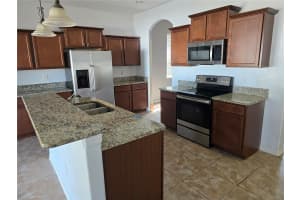 1803 PALM WARBLER LANE, RUSKIN, FL 33570 - MLS#MFRTB8476407