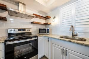 620 EDGEWATER DRIVES, DUNEDIN, FL 34698 - MLS#MFRTB8484238