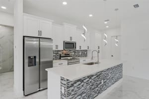 12 17TH AVENUE, CAPE CORAL, FL 33990 - MLS#MFRTB8488854