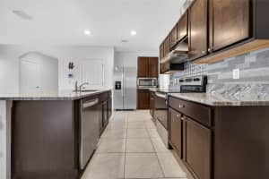 17048 OVAL RUM DRIVE, WIMAUMA, FL 33598 - MLS#MFRTB8491695