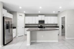 7217 RONNIE GARDENS COURT, TAMPA, FL 33619 - MLS#MFRTB8492926