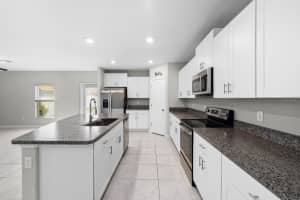 7217 RONNIE GARDENS COURT, TAMPA, FL 33619 - MLS#MFRTB8492926