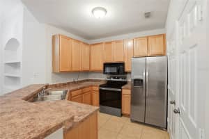 9916 COURTNEY PALMS BOULEVARD, TAMPA, FL 33619 - MLS#MFRTB8500143