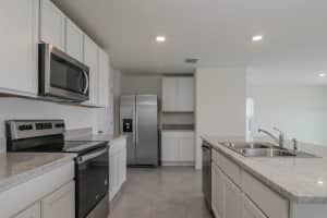 477 SUNLIT CORAL STREET, RUSKIN, FL 33570 - MLS#MFRTB8501915