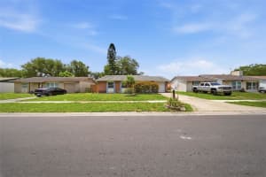 7976 SHADOW RUN DRIVE, LARGO, FL 33773 - MLS#MFRTB8506565