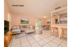 8702 FISH LAKE ROAD, TAMPA, FL 33619 - MLS#MFRTB8517277