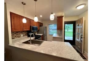 1467 MISSION HILLS BLVD #61-A, CLEARWATER, FL 33759 Sold 02/14/23