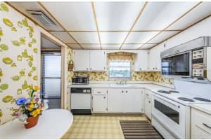 4575 COVE CIRCLE, ST PETERSBURG, FL 33708 Sold 07/07/23
