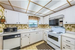 4575 COVE CIRCLE, ST PETERSBURG, FL 33708 Sold 07/07/23