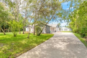 5803 SPRUCE CREEK WOODS DRIVE, PORT ORANGE, FL 32127 Sold 09/16/24