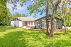 5803 SPRUCE CREEK WOODS DRIVE, PORT ORANGE, FL 32127 Sold 09/16/24