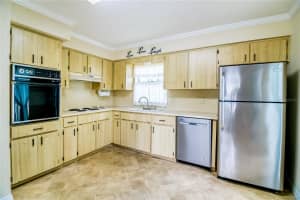 6710 HICKORYWOOD LN #1B, NEW PORT RICHEY, FL 34653 - MLS#MFRW7874234
