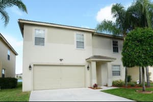 6634 Rainwood Cove Lane, Lake Worth Beach, FL 33463 Sold 12/26/23