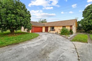 301 Canterbury Drive W, Riviera Beach, FL 33407 Sold 07/26/24