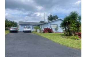 6107 Rainbow Circle, Greenacres, FL 33463 Sold 05/31/24