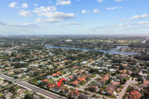 7569 N Nemec Drive N, Lake Clarke Shores, FL 33406 Sold 08/20/24