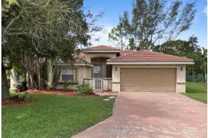 124 Sycamore Drive, Royal Palm Beach, FL 33411 Sold 11/26/24