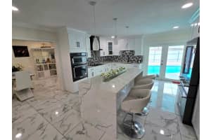 268 Holly Drive, Royal Palm Estates, FL 33415 Sold 09/30/24