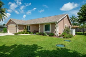 104 W Rubber Tree Drive, Lake Worth, FL 33467 Sold 03/18/25