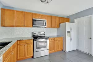 1571 Woodbridge Lakes Circle, West Palm Beach, FL 33406 Sold 12/12/24