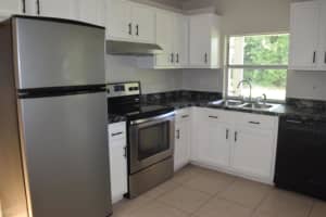702 SW Arkansas Terrace, Port Saint Lucie, FL 34953 - MLS#R11098943
