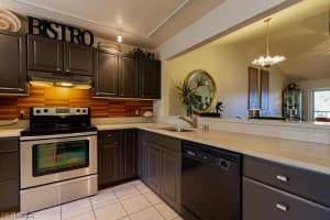 5634 Woodmere Lake Cir B-203, NAPLES